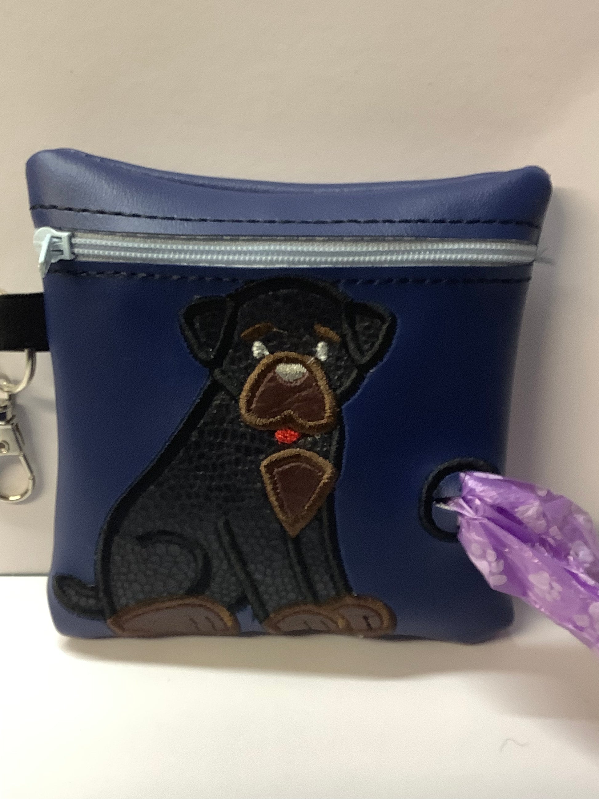 Rottweiler poo bag dispenser on Blue Bag - happy-dogs-togs