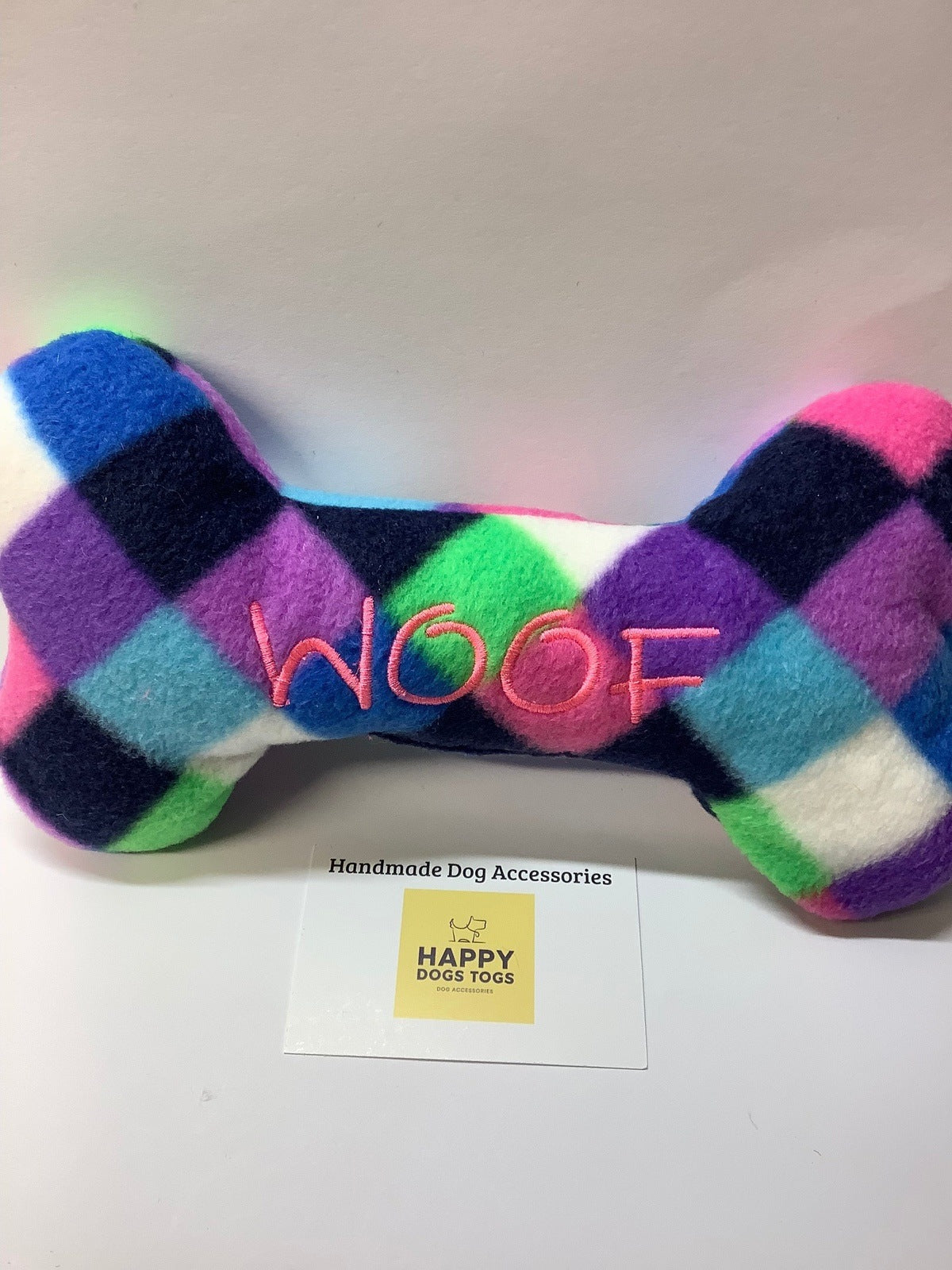 Purple  Harlequin  Fleece Woof bone shape handcrafted dog toy