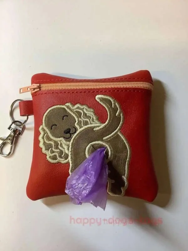 Embroidered Fawn Spaniel Poo Bag Dispenser On Red Bag