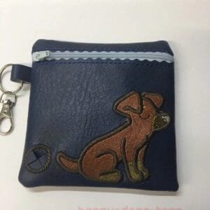 Navybluedachshundsittingembroidereddogpoobagdispenser Happy Dogs Togs1