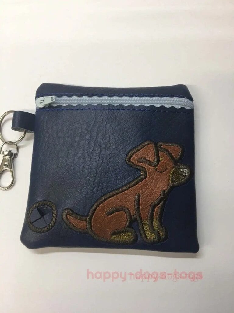 Navybluedachshundsittingembroidereddogpoobagdispenser Happy Dogs Togs1