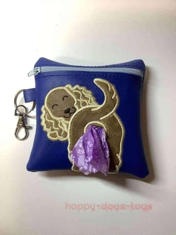 Poop Bag Dispenser Fawn Spaniel On Blue Bag