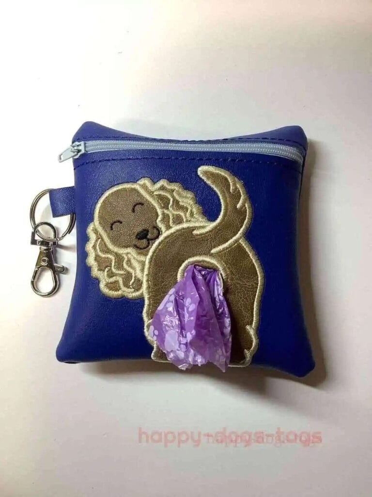 Poopbagdispenserfawnspanielonbluebag Happy Dogs Togs1