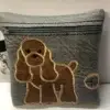 Tan Cocker Spaniel poo bag dispenser